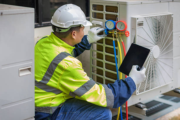 Professional Ac Installation technician working in Linwood, MA